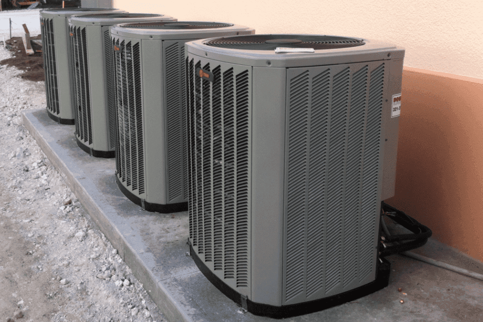 A row of condenser units installed at a veterinary clinic by Deck-Aire